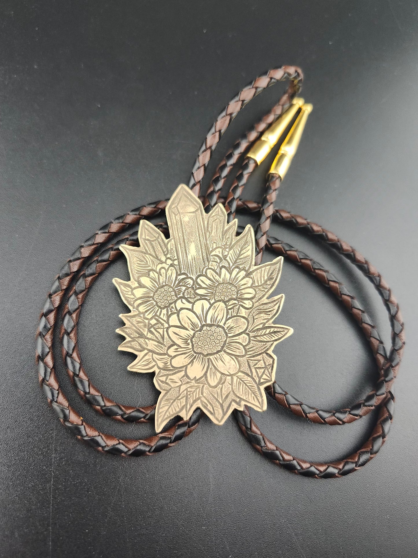 Botanical Bolo Tie – Hand-Engraved Brass on Braided Leather