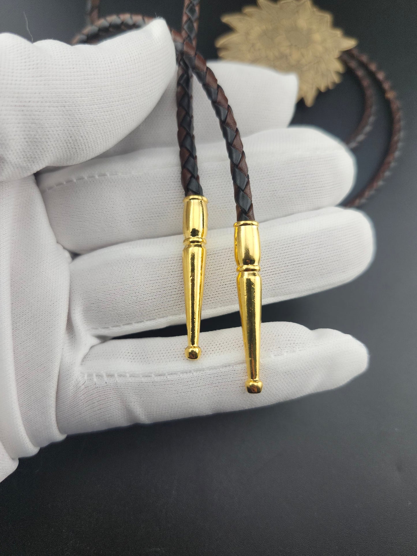Botanical Bolo Tie – Hand-Engraved Brass on Braided Leather