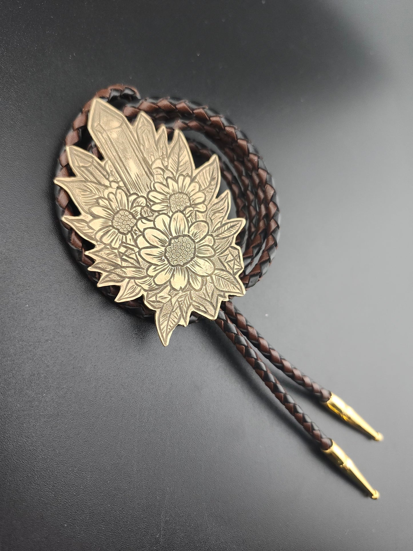 Botanical Bolo Tie – Hand-Engraved Brass on Braided Leather