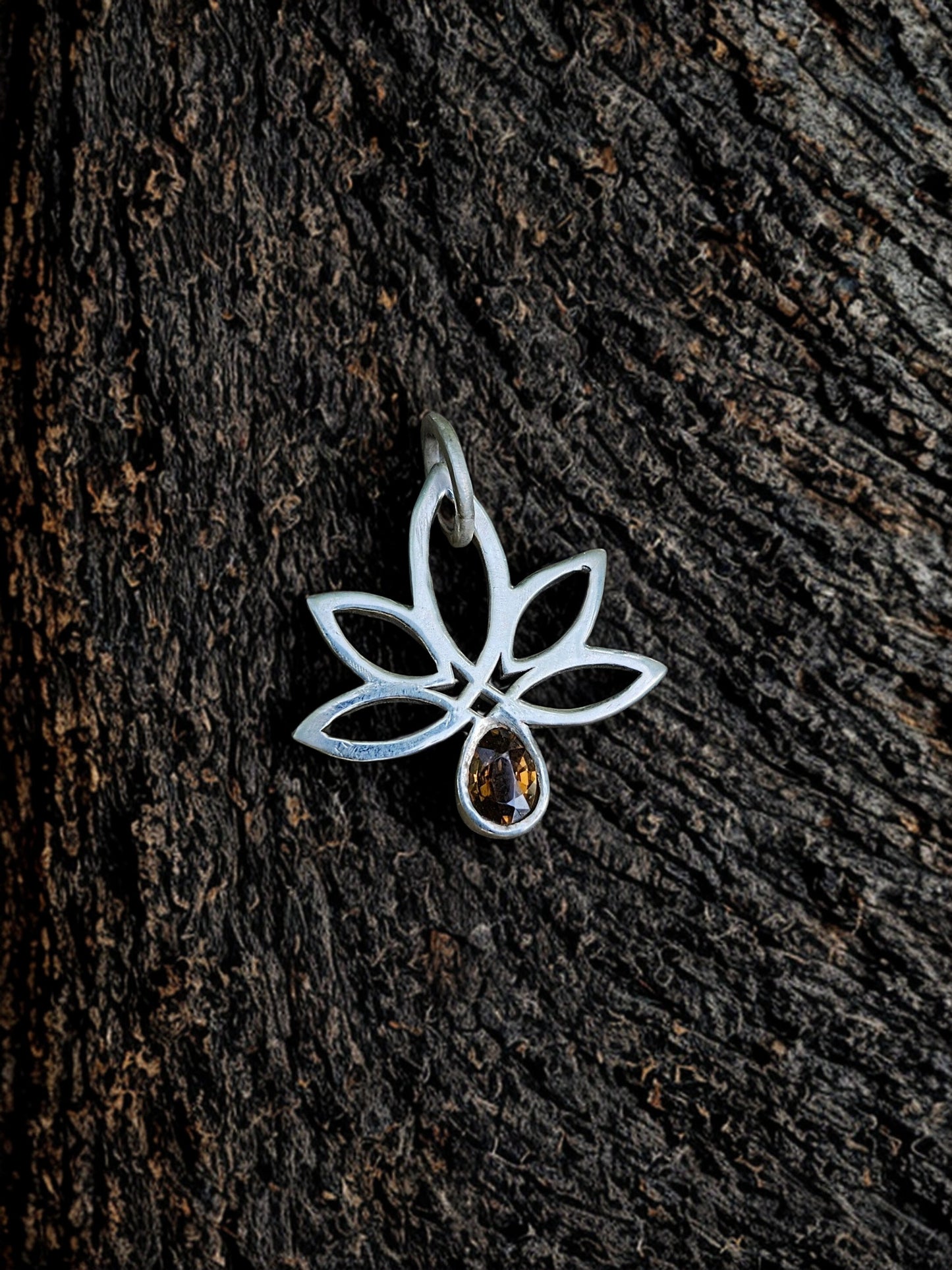 Celtic Leaf Pendant – Sterling Silver with Golden Zircon