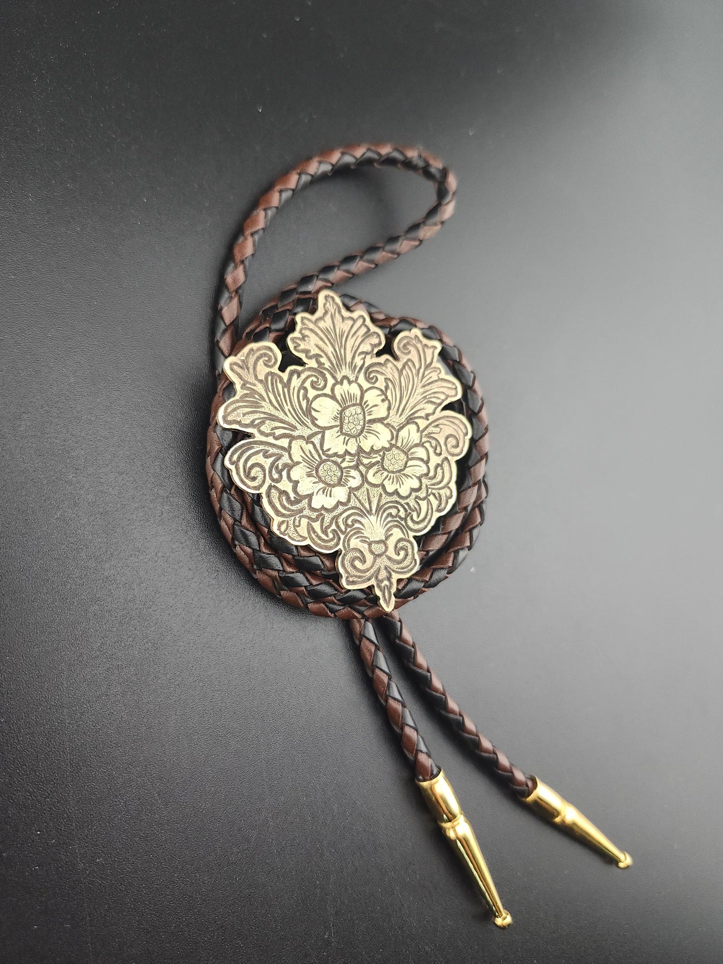 Filigree Bouquet Bolo Tie – Hand-Engraved Brass on Braided Leather