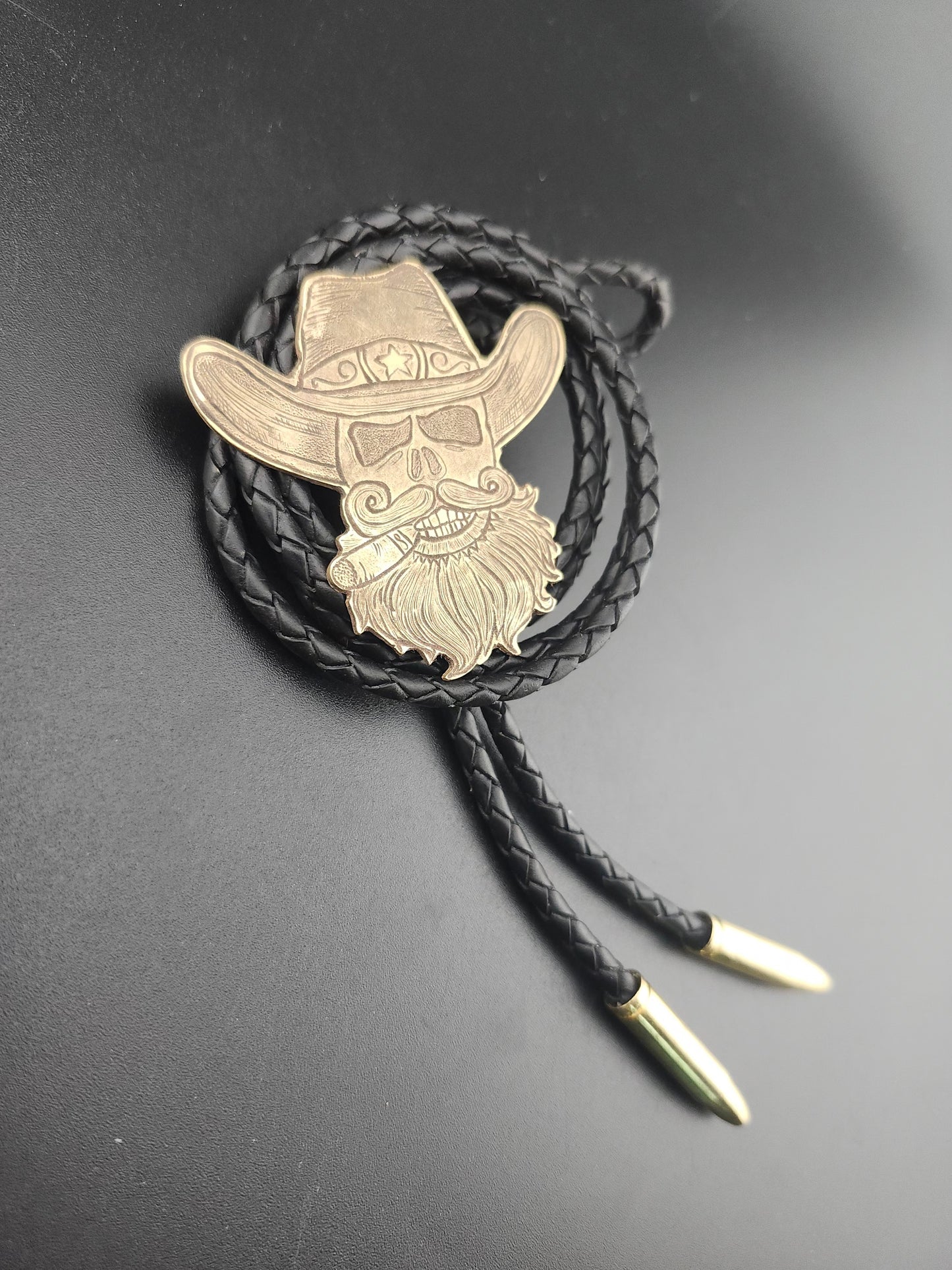 The Outlaw Bolo Tie – Hand-Engraved Brass with Bullet Tips