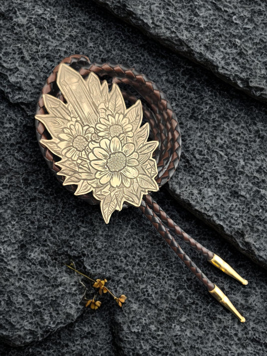 Botanical Bolo Tie – Hand-Engraved Brass on Braided Leather