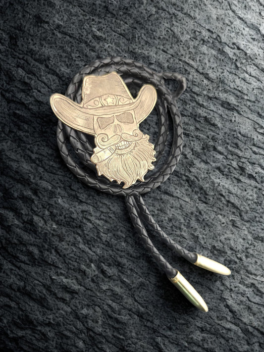 The Outlaw Bolo Tie – Hand-Engraved Brass with Bullet Tips